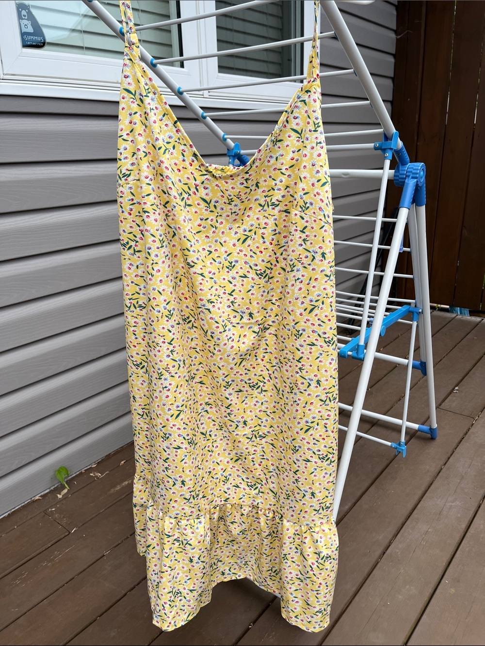 Yellow Floral Slip Dress with sweetheart neckline Ruffle Hem. Spaghetti strap.